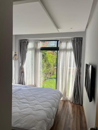 Voodi või voodid majutusasutuse Pearl Rabat Garden Stay toas