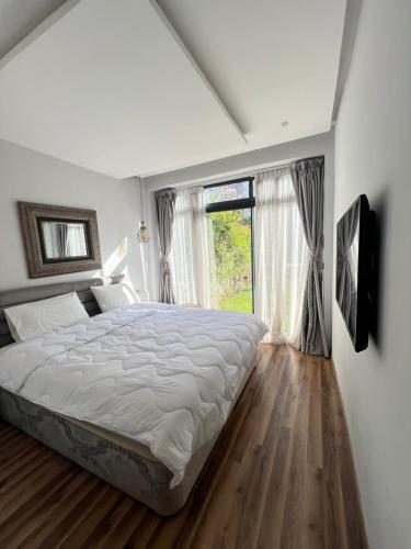 Voodi või voodid majutusasutuse Pearl Rabat Garden Stay toas