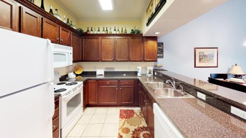 Η κουζίνα ή μικρή κουζίνα στο Village at the Glens S 205