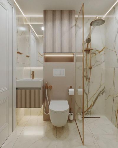 a bathroom with a toilet and a sink at Lenarda hotel in Nggorang