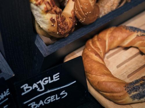 a display of breads and pastries in a bakery at Vienna House Easy by Wyndham Berlin Prenzlauer Berg in Berlin