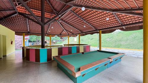 En eller flere senge i et værelse på Apartamentos Ecologic Ville