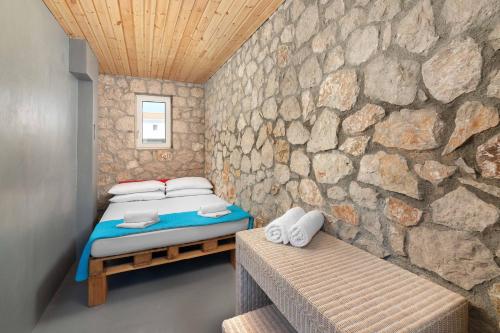 Postel nebo postele na pokoji v ubytování Ferienhaus In Kolympia Mit Privatem Garten