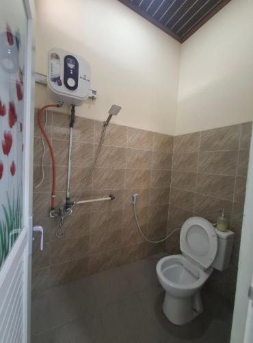 Koupelna v ubytování Mangkulio Guest House