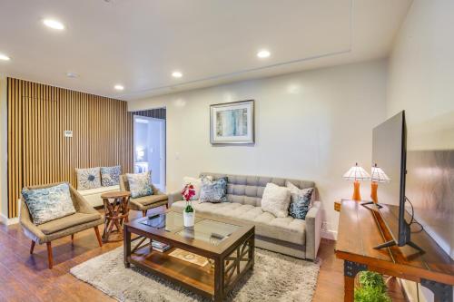 a living room with a couch and a table at Modern Duplex Near Gaylord Resort and Bayfront! in Chula Vista