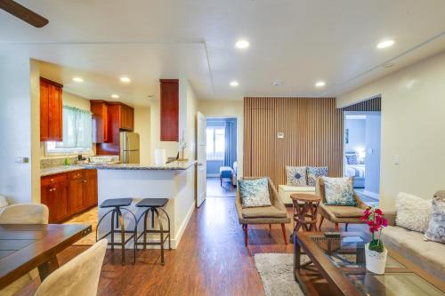a living room with a couch and a table at Modern Duplex Near Gaylord Resort and Bayfront! in Chula Vista