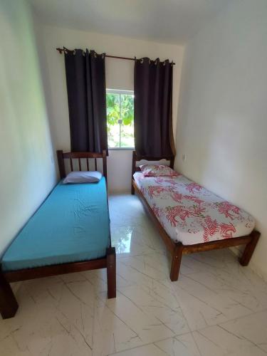 Postel nebo postele na pokoji v ubytování Casa do Deca Toledo - 500 metros do Centro Histórico