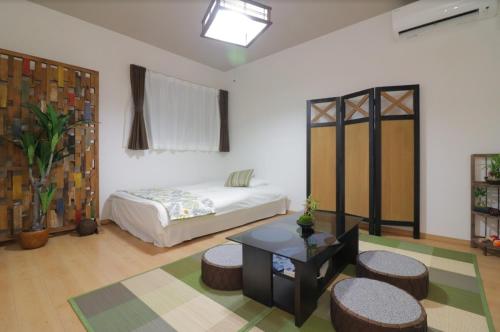 Postel nebo postele na pokoji v ubytování Cozy enjoyment hotel no.29