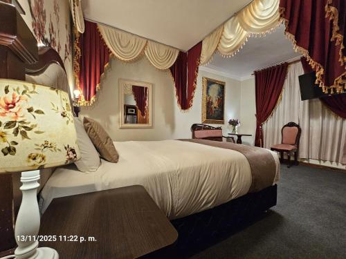 Una cama o camas en una habitación de Gya Hoteles