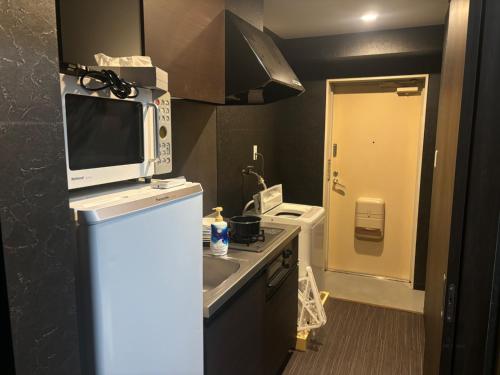 Kuchyň nebo kuchyňský kout v ubytování LEGALCOURT - Vacation STAY 17899