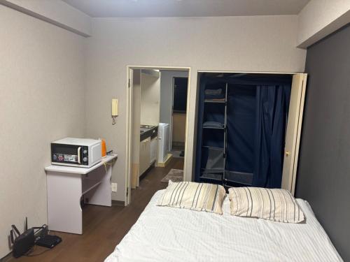 Postel nebo postele na pokoji v ubytování LEGALCOURT - Vacation STAY 18996