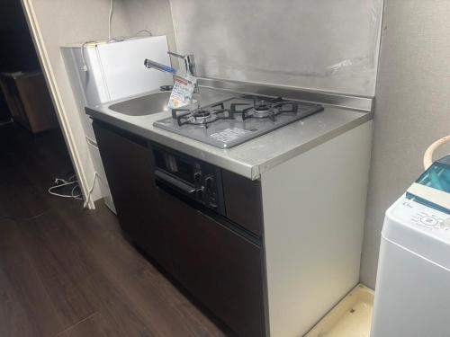 Kuchyň nebo kuchyňský kout v ubytování LEGALCOURT - Vacation STAY 18996