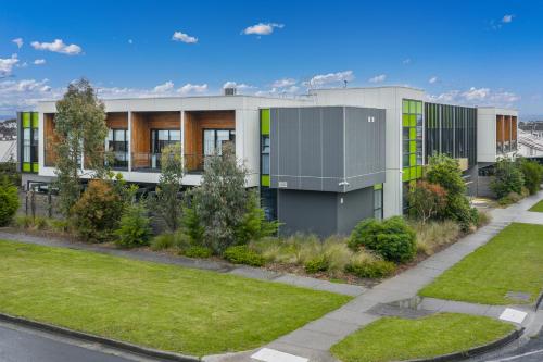 an image of a building with a garden at MJ McMahon Motel in Wonthaggi