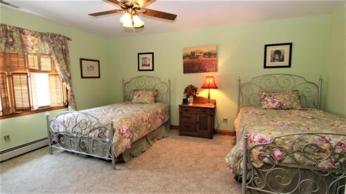 Voodi või voodid majutusasutuse The Duck Pond Cottage toas