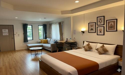 Ένα ή περισσότερα κρεβάτια σε δωμάτιο στο ViphuananResort