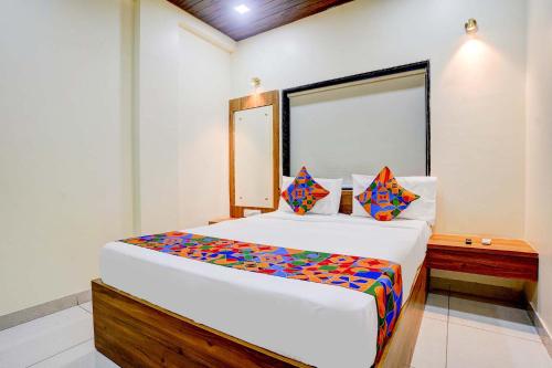 Postel nebo postele na pokoji v ubytování Hotel Queen Inn