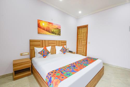 Ένα ή περισσότερα κρεβάτια σε δωμάτιο στο Hotel Renu Rooms