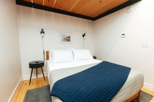 Ένα ή περισσότερα κρεβάτια σε δωμάτιο στο Loft 305 - The William - Atrium - Live Work Walk