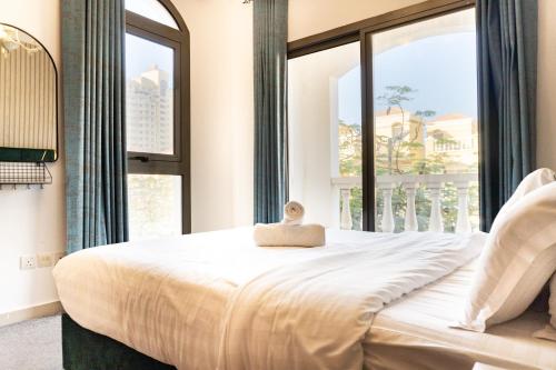 Voodi või voodid majutusasutuse Luxury 5BR Villa with Private Pool & Lagoon Views toas