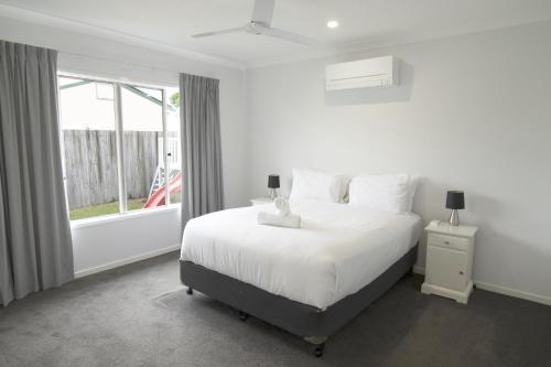 Ένα ή περισσότερα κρεβάτια σε δωμάτιο στο Spacious 4-Bed House in Leafy Plainland