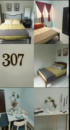 En eller flere senge i et værelse på Balqis Homestay kuantan