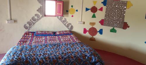 Voodi või voodid majutusasutuse Rann Roshni homestay toas