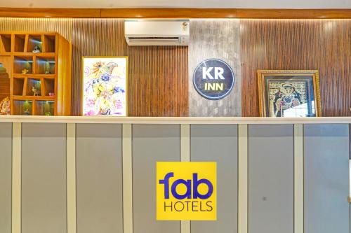 a frito lay restaurant with a sign on the wall at Hotel Rohan Palace in Vrindāvan