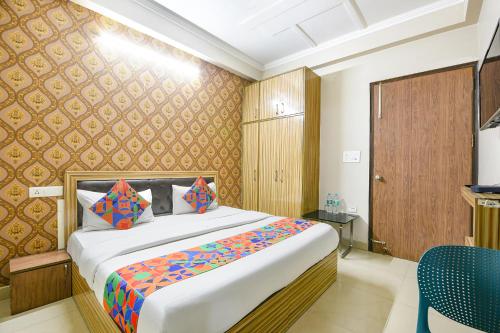 Ένα ή περισσότερα κρεβάτια σε δωμάτιο στο Hotel Ring Roll Inn