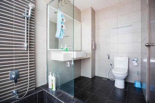 a bathroom with a shower and a toilet and a sink at SETAPAK CENTRAL KUALA LUMPUR - By ALOHA in Kuala Lumpur