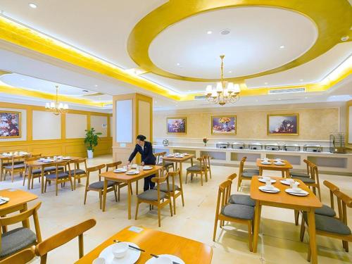 Εστιατόριο ή άλλο μέρος για φαγητό στο Vienna Hotel Hubei Xiangyang Tang City Gulou