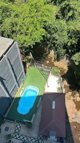 Piscina a Oasis Urbano o a prop