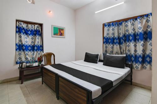 Ένα ή περισσότερα κρεβάτια σε δωμάτιο στο Hotel O Dream Marion