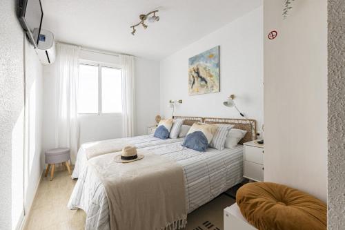 Postel nebo postele na pokoji v ubytování Casa Luna terraza mágica con vistas al mar