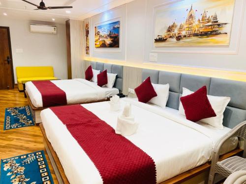 Ένα ή περισσότερα κρεβάτια σε δωμάτιο στο Shree Shanteshwar Mahadev Inn