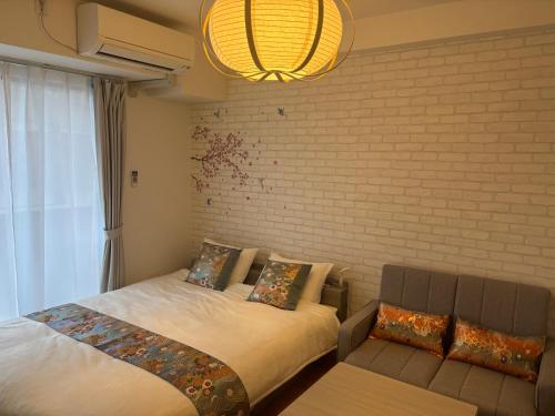 En eller flere senge i et værelse på ミミハウス幕張