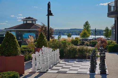 a chess board in the middle of a garden at Hotel Canandaigua, Tapestry Collection By Hilton in Canandaigua