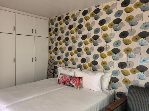 En eller flere senge i et værelse på Unit 47 Oceanic