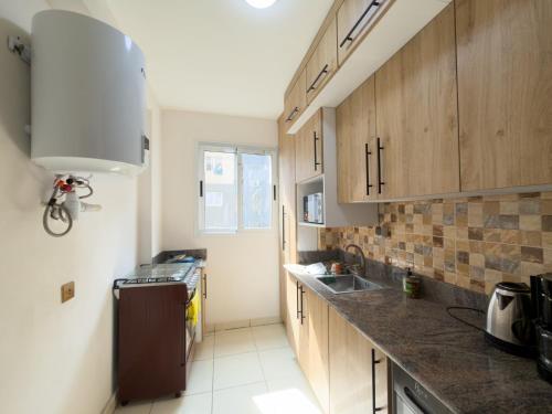 Η κουζίνα ή μικρή κουζίνα στο Lagoon Suites