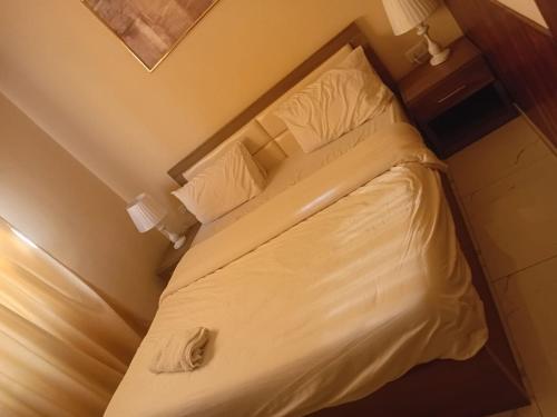 Cama o camas de una habitación en VIPOneAmman