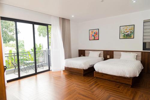 Ένα ή περισσότερα κρεβάτια σε δωμάτιο στο Luxury 88 Hotel