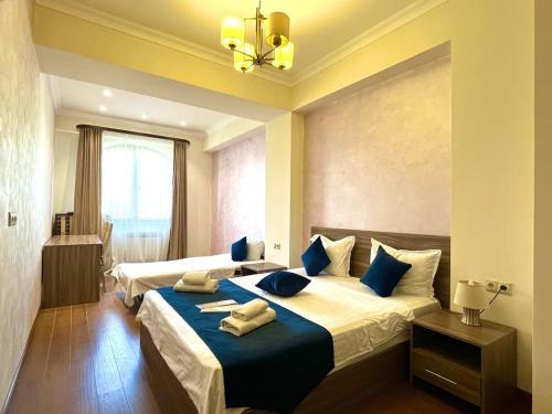 Ένα ή περισσότερα κρεβάτια σε δωμάτιο στο Mandarin apartments