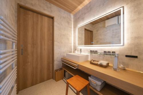 Ένα μπάνιο στο HIGASHIKAWA Villa 瑞月