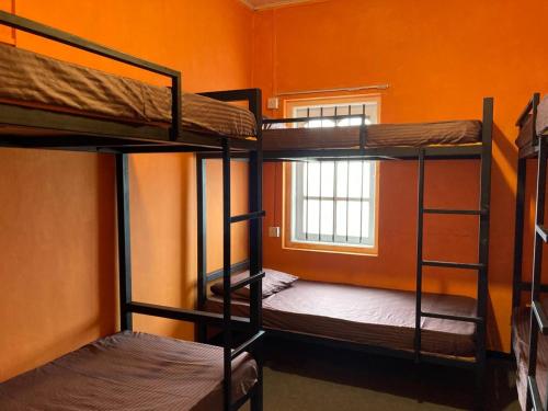 Ένα ή περισσότερα κρεβάτια σε δωμάτιο στο C'est La Vie