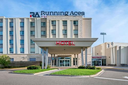 a building with a hotel sign on top of it at Running Aces Hotel & Casino, Trademark Collection by Wyndham in Forest Lake