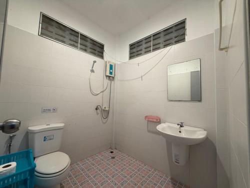 a bathroom with a toilet and a sink at Mandala bungalow at Ya Nui beach in Rawai Beach