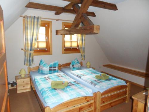 Ένα ή περισσότερα κρεβάτια σε δωμάτιο στο Ferienwohnanlage John