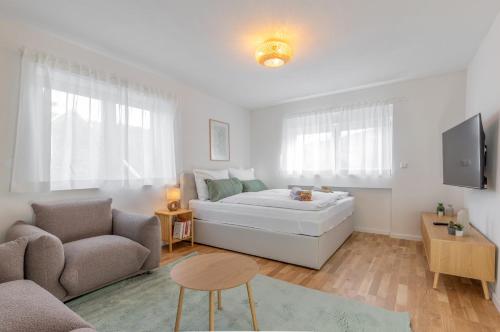 Ένα ή περισσότερα κρεβάτια σε δωμάτιο στο Waldnest Apartment - Wohnung - Schwarzwald