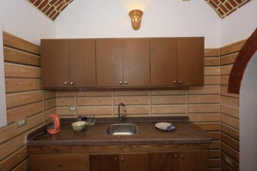 Kuchyň nebo kuchyňský kout v ubytování Beit Al Madina