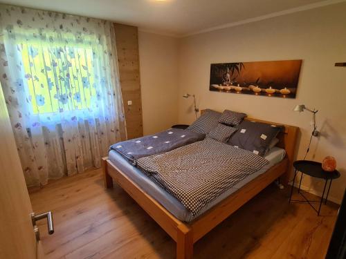 Postel nebo postele na pokoji v ubytování "Chalet Imberg", Oberstaufen-Steibis