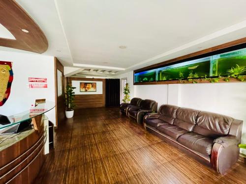 Ein Sitzbereich in der Unterkunft Oval Retreat